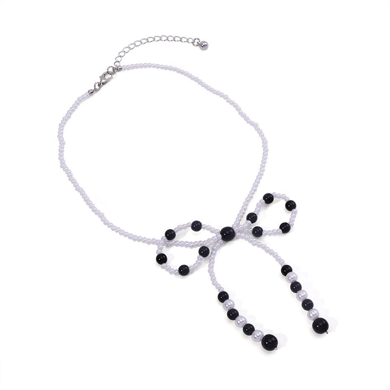 Faux Pearl Bow Necklace – Black/White